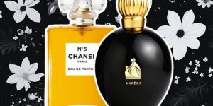 Perfumes Chanel No 5 e Arpège de Lavvin lado a lado, em um fundo com flores em tons noturnos e escuros