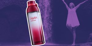 Montagem com uma mulher em uma cachoeira ao fundo e um frasco de Kaiak Aventura Feminino em destaque